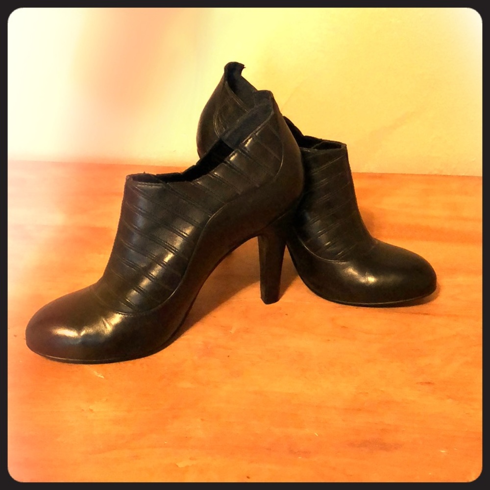 Black BCBGirls leather bootie heels